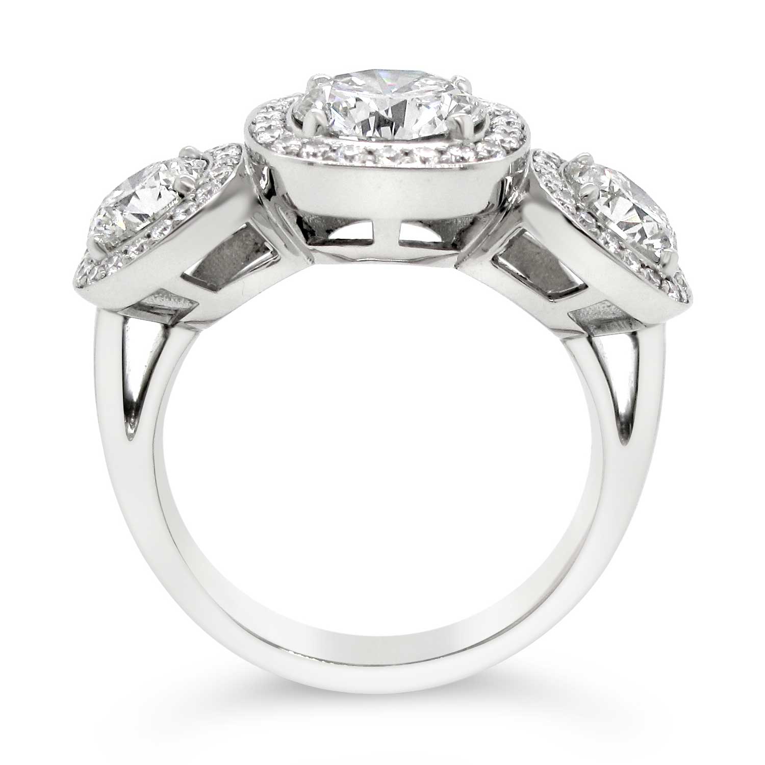 Platinum-3-stone-diamond-ring-with-cushion-diamond-halos