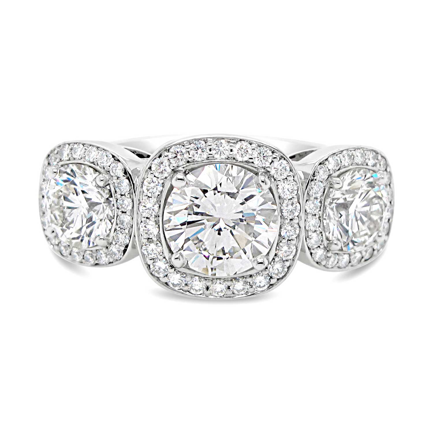 Platinum-3-stone-diamond-ring-with-cushion-diamond-halos
